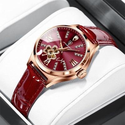 Waterproof ladies watch calendar with a red strap and elegant design, perfect for modern women.